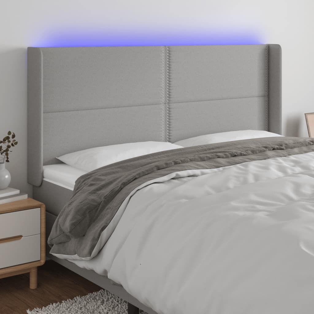 Hoofdbord LED 203x16x118/128 cm stof lichtgrijs is nu te koop bij PeponiXL, paradijselijk wonen!